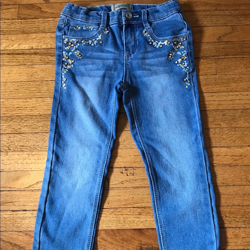2 pairs of little girls Squeeze Jeans